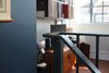 Modern home with Staircase, Metal Railing, and Wood Tread. The handrail forms the first floor balustrade Photo 8 of The Science Lab