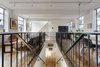 Modern home with Staircase, Metal Railing, and Wood Tread. View across the first floor Photo 16 of The Science Lab