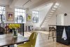 Modern home with Kitchen, Track Lighting, Medium Hardwood Floor, and Metal Counter. Dining area with kitchen island Photo 17 of The Science Lab