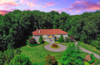 Modern home with Outdoor, Trees, Gardens, Garden, Grass, Front Yard, and Walkways. Cotton Candy Skies over NJ's most exclusive community Photo of Prestigious European-Inspired Mansion Just Outside NYC