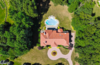 Modern home with Exterior, Green Roof Material, and House Building Type. Aerial views Photo 3 of Prestigious European-Inspired Mansion Just Outside NYC