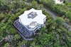 This geometric contemporary home is situated on the only stand-alone lot in Hideaway Beach. Photo 2 of A Zen Marco Island Retreat modern home