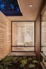 Modern home with Pendant Lighting. The teak paneling continues through to the exterior Photo 14 of Union Bay Residence
