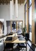 Modern home with Dining Room, Ceiling Lighting, Table, Concrete Floor, Stools, and Pendant Lighting. Dining area flooded with light Photo 11 of Woodland house