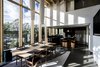 Modern home with Kitchen, Ceiling Lighting, Refrigerator, Wood Backsplashe, Undermount Sink, Wood Cabinet, Pendant Lighting, Wood Counter, Dishwasher, and Concrete Floor. Kitchen view open plan living - perfect for social people Photo 12 of Woodland house