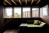 Modern home with Hallway. Upper hallway overlooking meadows Photo 10 of Woodland house