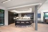 Modern home with Kitchen, Dishwasher, Marble Counter, Range Hood, Light Hardwood Floor, Range, Recessed Lighting, Ceiling Lighting, Microwave, Wood Cabinet, Refrigerator, Accent Lighting, Stone Slab Backsplashe, Wall Oven, and Undermount Sink. Kitchen Photo 16 of Oxford Residence