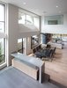 Modern home with Dining Room, Porcelain Tile Floor, Pendant Lighting, Light Hardwood Floor, Chair, Table, Recessed Lighting, and Ceiling Lighting. Double Height Volume - Entry & Dining Photo 10 of Oxford Residence