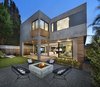 Modern home with Exterior, Wood Siding Material, Flat RoofLine, House, Stucco Siding Material, and Metal Siding Material. Rear Yard View Photo 5 of Oxford Residence