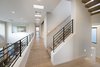 Modern home with Staircase, Wood Railing, Wood Tread, and Metal Railing. Second Floor Walkway & Stair Photo 15 of Oxford Residence