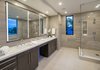 Modern home with Bath Room, Undermount Sink, Wall Lighting, Ceiling Lighting, Stone Tile Wall, Engineered Quartz Counter, Porcelain Tile Floor, Accent Lighting, Freestanding Tub, Enclosed Shower, and Recessed Lighting. Master Bath Photo 17 of Oxford Residence
