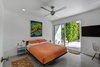 Guest bedroom with queen bed and private patio. Photo 5 of Donald Wexler's Steel House #4 in Palm Springs modern home