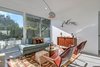 Living room with private, east-facing patio. Photo 8 of Donald Wexler's Steel House #4 in Palm Springs modern home