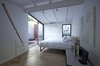 Modern home with Ceiling Lighting, Light Hardwood Floor, and Track Lighting. main bedroom Photo 11 of Grey House