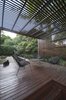 Modern home with Outdoor, Decking Patio, Porch, Deck, Garden, Hardscapes, Trees, Shrubs, Wood Patio, Porch, Deck, and Back Yard. deck - seating area Photo 4 of Grey House