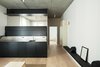 Modern home with Kitchen, Metal Counter, Undermount Sink, Medium Hardwood Floor, Wood Cabinet, Ceiling Lighting, Metal Backsplashe, and Cooktops. Kitchen cabinet | open version Photo 2 of A-PLACE by Thisispaper Studio