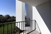 Modern home with House, Shed RoofLine, Stucco Siding Material, and Metal Roof Material. Villa Rosa, detail south facade Photo 3 of Villa Rosa