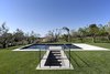 Modern home with Shed RoofLine, Concrete Siding Material, Metal Roof Material, and Stone Siding Material. Villa Rosa, the pool Photo 4 of Villa Rosa