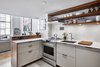 Modern home with Kitchen. Cooktop by GE
Hood by Faber
Sink and Faucet by Blanco Photo 4 of 4th Ave./Union Square Apartment