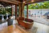 Modern home with Bath Room, Freestanding Tub, Soaking Tub, and Open Shower. Handcrafted wooden tub with outdoor shower in private garden. Photo 6 of Launiupoko Luxury Estate