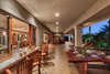 Al fresco dining area with pass-through window Photo 6 of Majestic Maui Estate modern home