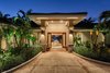 Entrance with gas torches Photo 12 of Majestic Maui Estate modern home