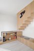 Modern home with Staircase, Wood Tread, and Wood Railing. View of the stairs leading to the attic Photo 3 of Into the Woods