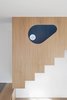 Modern home with Staircase, Wood Railing, and Wood Tread. The eye-shaped hole of the stairs volume Photo 5 of Into the Woods