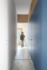 Modern home with Hallway. The corridor, with the mirrored door closed Photo 9 of Into the Woods