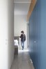Modern home with Hallway. The corridor, with the mirrored door opened Photo 10 of Into the Woods