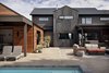 Modern home with Outdoor, Concrete Patio, Porch, Deck, Back Yard, and Swimming Pools, Tubs, Shower. Large concrete patio for entertaining family and guests. Photo 5 of Renton Hill House