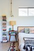 Modern home with Bedroom, Bed, Night Stands, Table Lighting, Light Hardwood Floor, and Rug Floor. Detail of Guest Bedroom Photo 16 of Midcentury Dream House