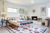 Modern home with Bedroom, Lamps, Light Hardwood Floor, Night Stands, Bed, Rug Floor, Pendant Lighting, and Chair. Guest Bedroom Photo 14 of Midcentury Dream House