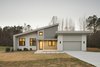 Modern home with Exterior, House Building Type, Wood Siding Material, Shed RoofLine, and Shingles Roof Material. Exterior Front Photo of House 16