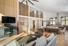 Modern home with Living Room, Standard Layout Fireplace, Coffee Tables, Recessed Lighting, Light Hardwood Floor, Sofa, and Chair. Living Area Photo 6 of House 16