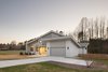 Modern home with Exterior, Wood Siding Material, Shingles Roof Material, House Building Type, and Shed RoofLine. Exterior Front Photo 3 of House 16