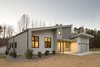 Modern home with Exterior, Shingles Roof Material, House Building Type, Wood Siding Material, and Shed RoofLine. Exterior Front Photo 2 of House 16