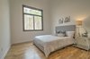 Modern home with Bedroom, Recessed Lighting, Night Stands, Bed, and Light Hardwood Floor. Secondary Bedroom Photo 11 of House 23