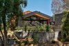 Modern home with Outdoor, Front Yard, Hardscapes, Shrubs, Side Yard, and Trees. Saddle Peak Residence by AUX Architecture Photo 2 of Saddle Peak Residence