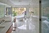Modern home with Bath Room, Engineered Quartz Counter, and Freestanding Tub. Saddle Peak Residence by AUX Architecture Photo 10 of Saddle Peak Residence