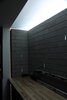 Modern home with Garage, Storage Room Type, Sun Room Room Type, and Attached Garage Room Type. work bench with skylight and slotted glass inserts in masonry Photo 10 of Summers