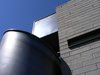 Modern home with Exterior, Concrete Siding Material, Metal Siding Material, Flat RoofLine, Metal Roof Material, Brick Siding Material, and House Building Type. Hot rolled steel spiral staircase juxtaposed against CMU block with glass inserts. Photo 6 of Summers
