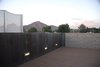 Modern home with Outdoor, Vertical Fences, Wall, Metal Fences, Wall, Horizontal Fences, Wall, Rooftop, and Boulders. Rooftop deck above master bath Photo of Summers