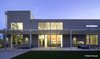 Modern home with Exterior, Flat RoofLine, Concrete Siding Material, and House Building Type. Double height Kitchen viewed from backyard. Photo 15 of Essence of the Desert