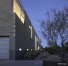 Modern home with Outdoor, Landscape Lighting, Trees, Concrete Patio, Porch, Deck, Front Yard, Hardscapes, and Gardens. masonry West and South wall joinery giving rise to the corner window. Luminarias leading down to Fabric entry scrim. Photo 13 of Essence of the Desert