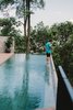 Modern home with Outdoor, Infinity Pools, Tubs, Shower, Large Pools, Tubs, Shower, and Trees. Infinity pool by forest Photo of The Window House