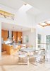 Oakland Hills I was designed by architect Andrew Morrall and his partner as a place to live and work in. High ceilings, skylights, and a plentitude of windows connect the home to the surrounding forest. Photo 7 of Modern, Elegant Architect's Home modern home