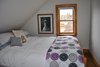 Modern home with Table Lighting. The queen bedroom - the funky fowl holds court Photo 20 of Featherbed Island House. Bayfront Vacation Rental