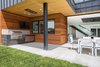 Modern home with Outdoor, Concrete Patio, Porch, Deck, and Large Patio, Porch, Deck. A built-in outdoor kitchen is just off the main, indoor kitchen extending the gatherings outdoors. Photo 10 of Purple Sage