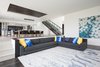 Complimentary colors brighten this living space. Photo 19 of Purple Sage modern home